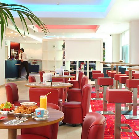 Ramada Encore Милтон-Кейнс Ресторан фото